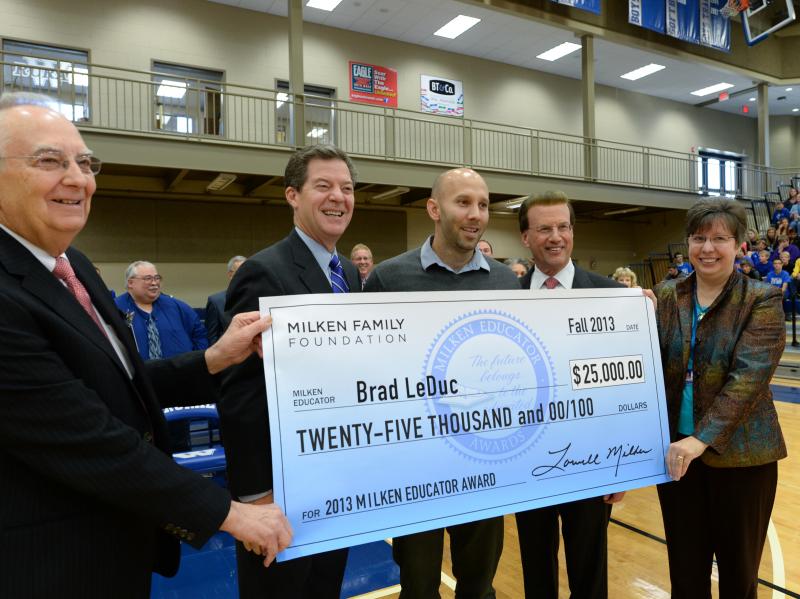 Brad LeDuc, Lowell Milken, Sam Brownback and VIPs with check Brad LeDuc, Lowell Milken, Sam Brownback and VIPs with check