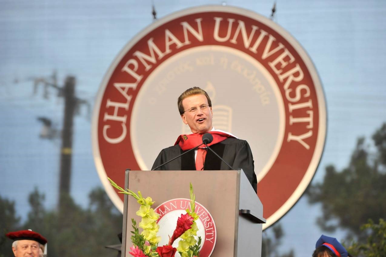 Lowell Milken addresses the 2015 graduating class of the Argyros School of Business and Economics