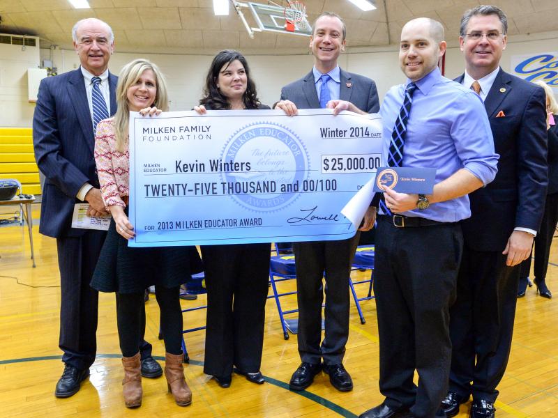 Kevin Winters group with check Kevin Winters group with check