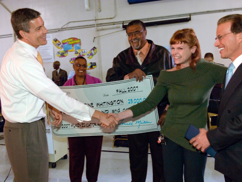 Lowell Milken and Arne Duncan Congratulate a Chicago Milken Educator